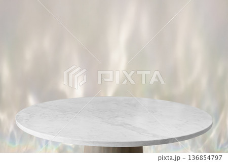Round marble table top with abstract shadow drop on white wall background for mockup product display 136854797