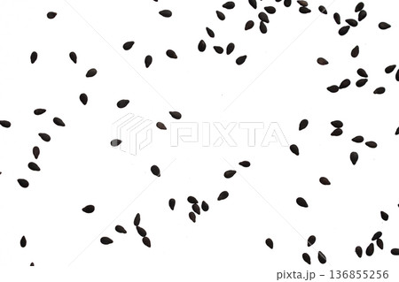 Black sesame seeds isolated on white background 136855256