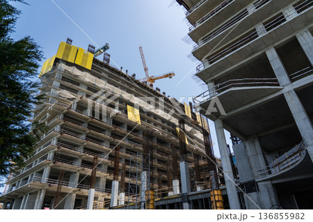 The construction of a skyscraper. Construction of a tall building in Batumi The construction of a skyscraper. Construction of a tall building in Batumi 136855982