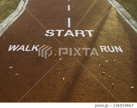 Athlete running track forward as motivation and inspiration 136859667