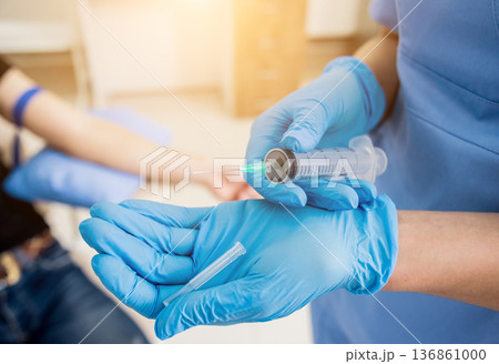 Nurse taking blood sample. Medical equipment. Blood test. 136861000
