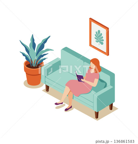 Woman reading book on teal sofa near large potted plant and framed leaf artwork in cozy living room interior 136861583