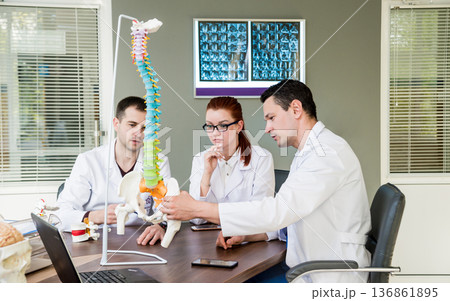 Doctors team having medical council in hospital. Doctors team having medical council in hospital. 136861895