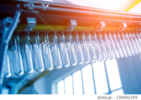 The plastic bottle blowing machine. PET preforms for blowing of plastic bottles 136862269