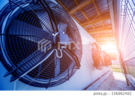 Metal industrial air conditioning vent. HVAC. Ventilation fan. 136862482
