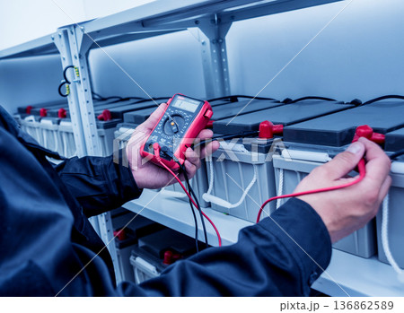 Electrical measurements with multimeter tester. Electrical background. 136862589