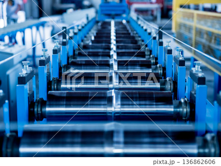 Metal sheet forming machine at the modern metalwork factory. Metal sheet forming machine at the modern metalwork factory. 136862606