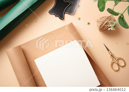 Empty gift box on the table for wrapping gifts. Place for your text. Empty gift box on the table for wrapping gifts. Place for your text. 136864012