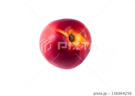 one whole peach on a white background in isolation 136864256
