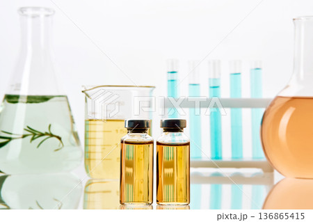 Science laboratory vials and beakers with liquids Science laboratory vials and beakers with liquids 136865415