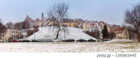 Winter Panorama Of Warsaw Old Town Skyline Above Snow Covered Vistula River Embankment 136865645