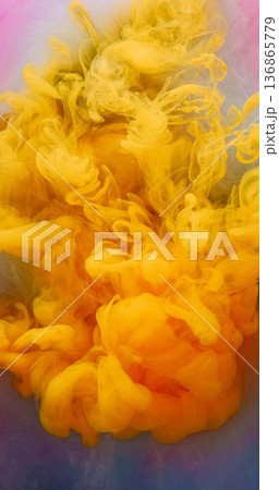 Fume paint blend. Steam ink drop. Defocused yellow pink blue color cloud fog vibrant water splash spreading on abstract art background. 136865779