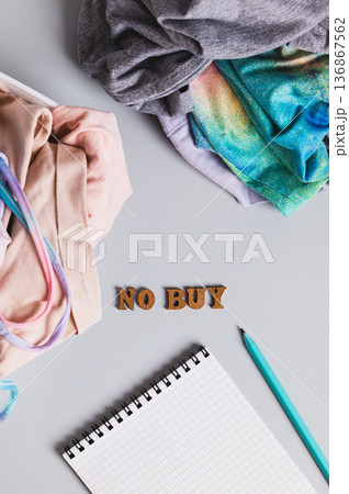 Clearing space and life of excess, sorting clothes concept top and vertical view Clearing space and life of excess, sorting clothes concept top and vertical view 136867562