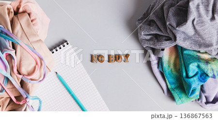 Clearing space and life of excess, sorting clothes concept top view web banner 136867563