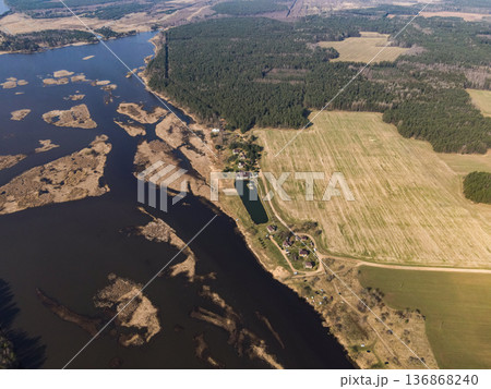 Aerial View of River, Forest, and Farmland Near Settlement in Belarus Aerial View of River, Forest, and Farmland Near Settlement in Belarus 136868240
