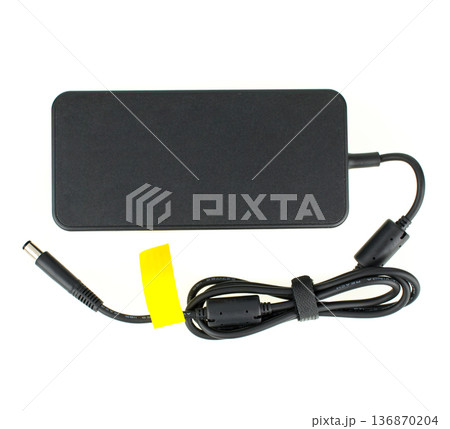 laptop power supply, laptop spare part, isolated on white background laptop power supply, laptop spare part, isolated on white background 136870204