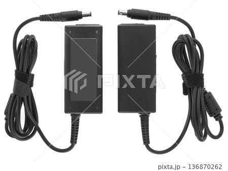 power supply for laptop, spare part for computer, on a white background 136870262