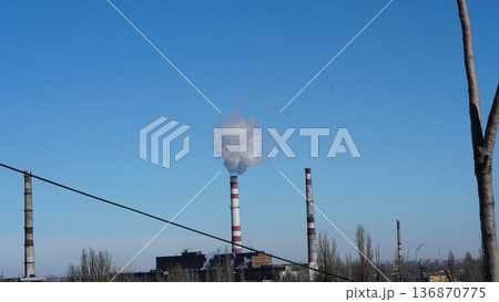 a large pipe from which smoke comes, industry, gas emissions a large pipe from which smoke comes, industry, gas emissions 136870775
