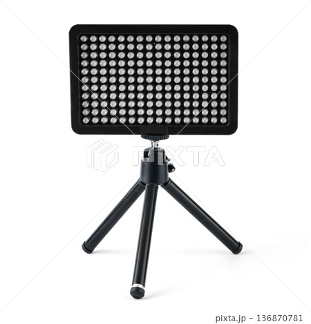 LED panel for video filming, LED lamp, on a white background on a tripod LED panel for video filming, LED lamp, on a white background on a tripod 136870781
