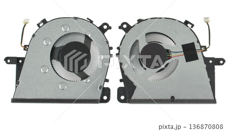 laptop fan, spare parts for a computer, on a white background in isolation laptop fan, spare parts for a computer, on a white background in isolation 136870808