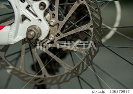 Rotor, brake disk on a bicycle wheel, close up 136870957