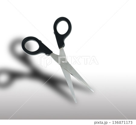 scissors with black pen and shadow on a white background in isolation 136871173