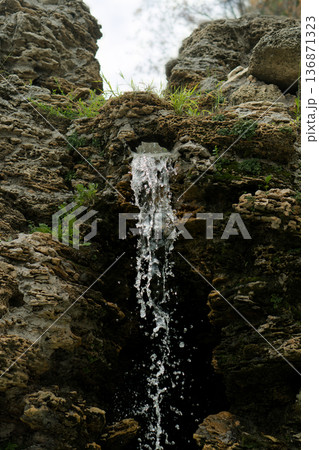 A waterfall, a fall of water originating from rock A waterfall, a fall of water originating from rock 136871323