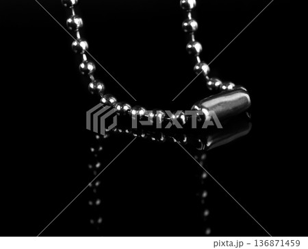 chain for a keychain, on a black background isolated with reflection chain for a keychain, on a black background isolated with reflection 136871459