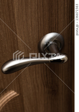 handle in the door, metal handle in the wooden door handle in the door, metal handle in the wooden door 136871563