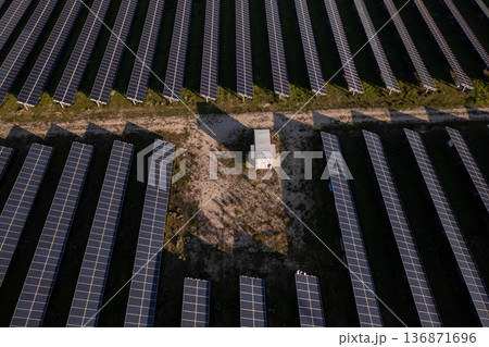 Rows of solar panels in countryside fields on Rows of solar panels in countryside fields on 136871696