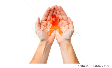 Hands clasping an orange ribbon on a transparent backdrop, highlighting support for leukemia awareness and blood cancer initiatives Hands clasping an orange ribbon on a transparent backdrop, highlighting support for leukemia awareness and blood cancer initiatives 136877409