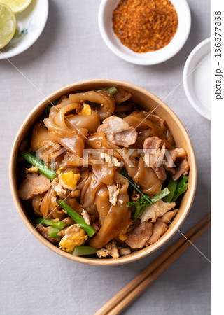 Thai food (Pad See Ew), Stir-fried rice noodles with soy sauce, pork, egg, and kale 136877868