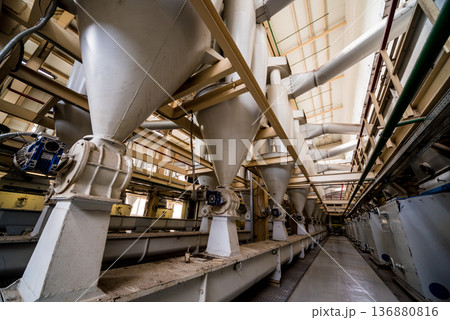 Interior of modern natural oil factory. The piping, pumps and motors Interior of modern natural oil factory. The piping, pumps and motors 136880816