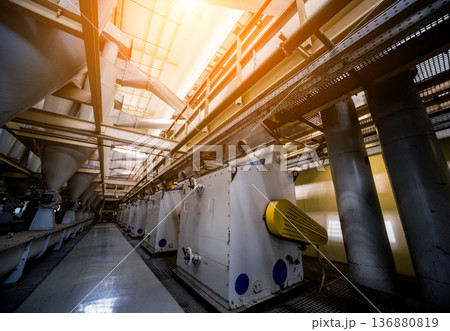 Interior of modern natural oil factory. The piping, pumps and motors Interior of modern natural oil factory. The piping, pumps and motors 136880819