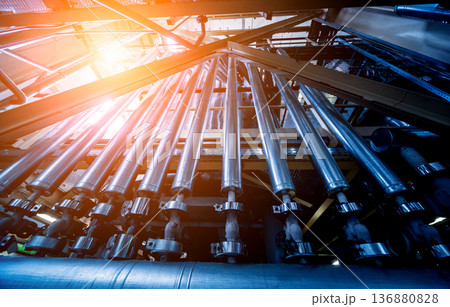 Interior of modern natural oil factory. The piping, pumps and motors 136880828