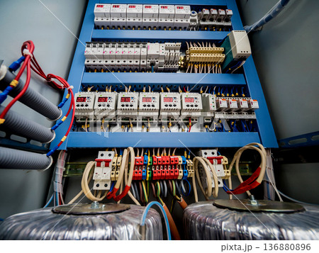 Voltage switchboard with circuit breakers. Electrical background. Voltage switchboard with circuit breakers. Electrical background. 136880896