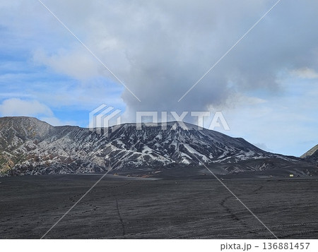 this is Bromo mountain with people and car this is Bromo mountain with people and car 136881457