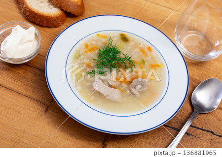 Traditional russian soup, rassolnik, served in bowl on table 136881965