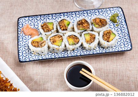 Sake Cooked Roll with baked salmon, avocado and fried onion 136882012