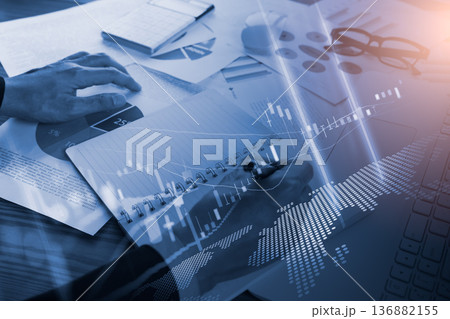 Stock market or forex trading graph and candlestick chart suitable for financial investment concept. Economy trends background for business idea and all art work design. Abstract finance background. Stock market or forex trading graph and candlestick chart suitable for financial investment concept. Economy trends background for business idea and all art work design. Abstract finance background. 136882155