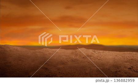 Dramatic low-angle view of a sandy desert mound under a fiery sunset sky with dark storm clouds and golden light. Ideal for cinematic backgrounds and conceptual themes 136882959