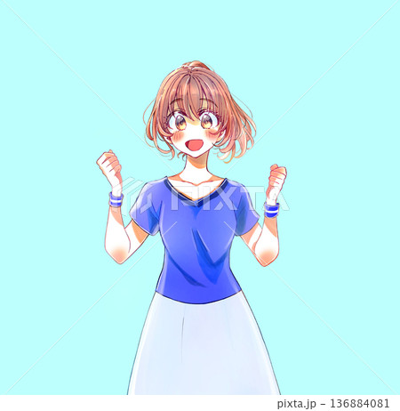 両手で握りこぶしを作る明るい表情の女性　青いユニフォーム 136884081