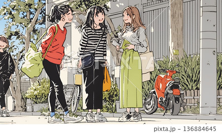 道端で会話を楽しむ若い主婦たち（ママ友たち）