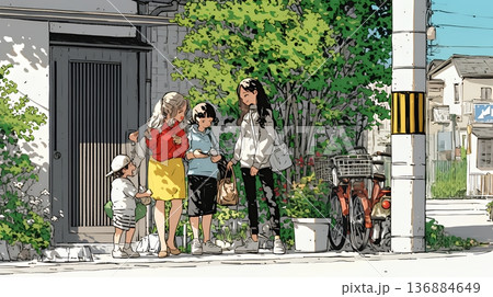 道端で会話を楽しむ若い主婦たち（ママ友たち）