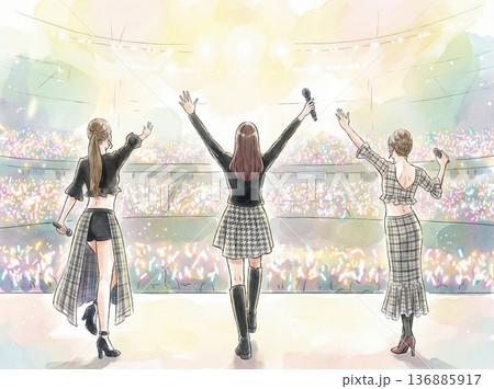 ガールズアイドルグループのライブパフォーマンスと光り輝くファンライト 136885917