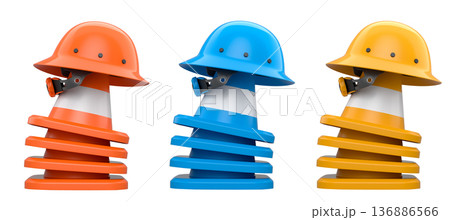 Stack of construction helmets and traffic cones isolated white background with clipping path, representing safety equipment 136886566