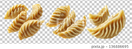 Set of Steamed Banana dumplings with intricate twisted edges, isolated on white background. Concept of Asian cuisine and food art Set of Steamed Banana dumplings with intricate twisted edges, isolated on white background. Concept of Asian cuisine and food art 136886695