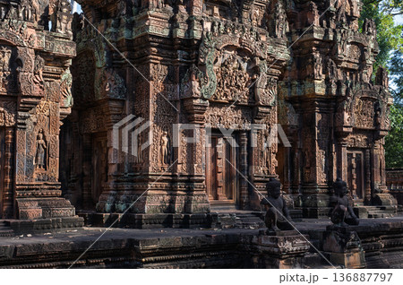 Ancient monkey guardian statues protecting entrance of banteay srei temple with intricate carvings in siem reap cambodia Ancient monkey guardian statues protecting entrance of banteay srei temple with intricate carvings in siem reap cambodia 136887797