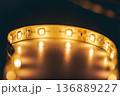 Warm white LED strip light macro close-up forming circular modern lighting background 136889227