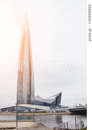 Stunning View of Lakhta Center With a Cloudy Sky and Reflections on the Water in Saint Petersburg Stunning View of Lakhta Center With a Cloudy Sky and Reflections on the Water in Saint Petersburg 136889868